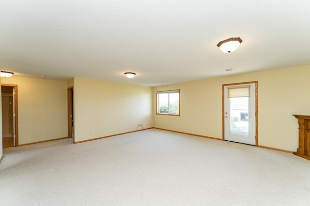4540 Prairie View Pl NW, Rochester, MN 55901 - empty room featuring baseboards and light carpet