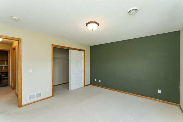 4540 Prairie View Pl NW, Rochester, MN 55901 - unfurnished bedroom with a closet and light colored carpet