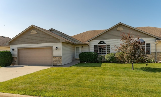 4540 Prairie View Pl NW, Rochester, MN 55901 - view of front of home with a garage, stone siding, concrete driveway, and a front yard
