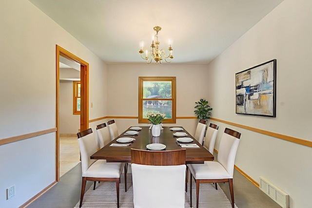 1636 9th Ave NE, Rochester, MN 55906 - dining room featuring a chandelier