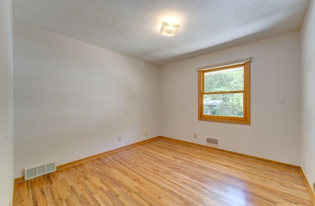 1636 9th Ave NE, Rochester, MN 55906 - unfurnished room with light wood-style flooring