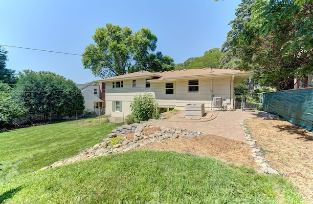 1636 9th Ave NE, Rochester, MN 55906 - rear view of house featuring a patio