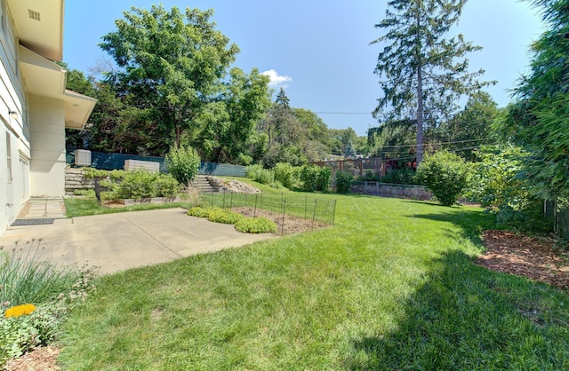 1636 9th Ave NE, Rochester, MN 55906 - view of yard with a patio area