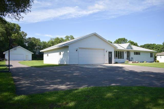 16014 240th St, Cold Spring, MN 56320 - view of front of property featuring a front lawn and an outdoor structure