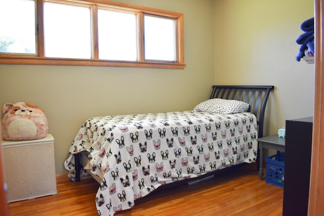 16014 240th St, Cold Spring, MN 56320 - bedroom featuring wood finished floors and multiple windows