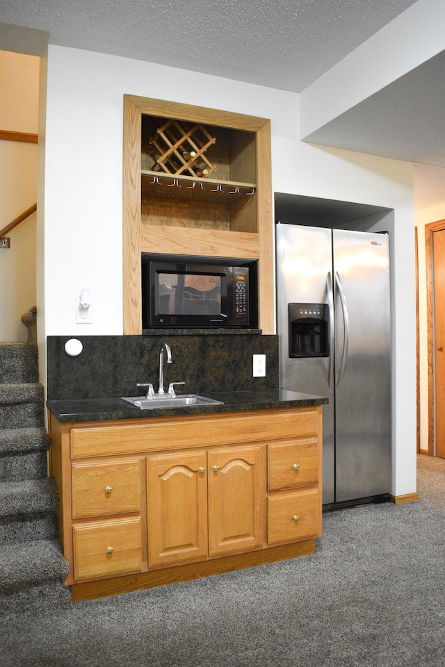 16014 240th St, Cold Spring, MN 56320 - kitchen with stainless steel refrigerator with ice dispenser, black microwave, carpet floors, and backsplash