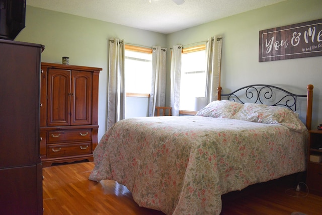 16014 240th St, Cold Spring, MN 56320 - bedroom featuring wood finished floors and a ceiling fan