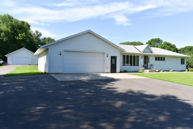 16014 240th St, Cold Spring, MN 56320 - ranch-style home featuring a front lawn, a shingled roof, and a garage