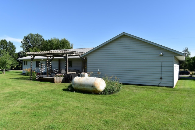 16014 240th St, Cold Spring, MN 56320 - view of side of home featuring a yard and a pergola