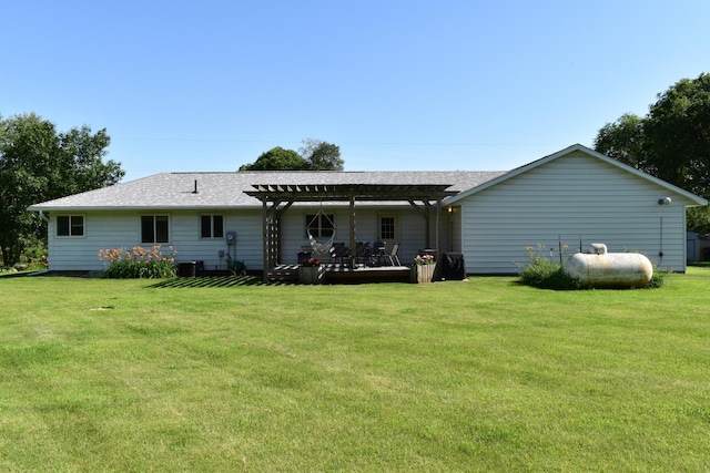 16014 240th St, Cold Spring, MN 56320 - rear view of house with a pergola, a lawn, and roof with shingles