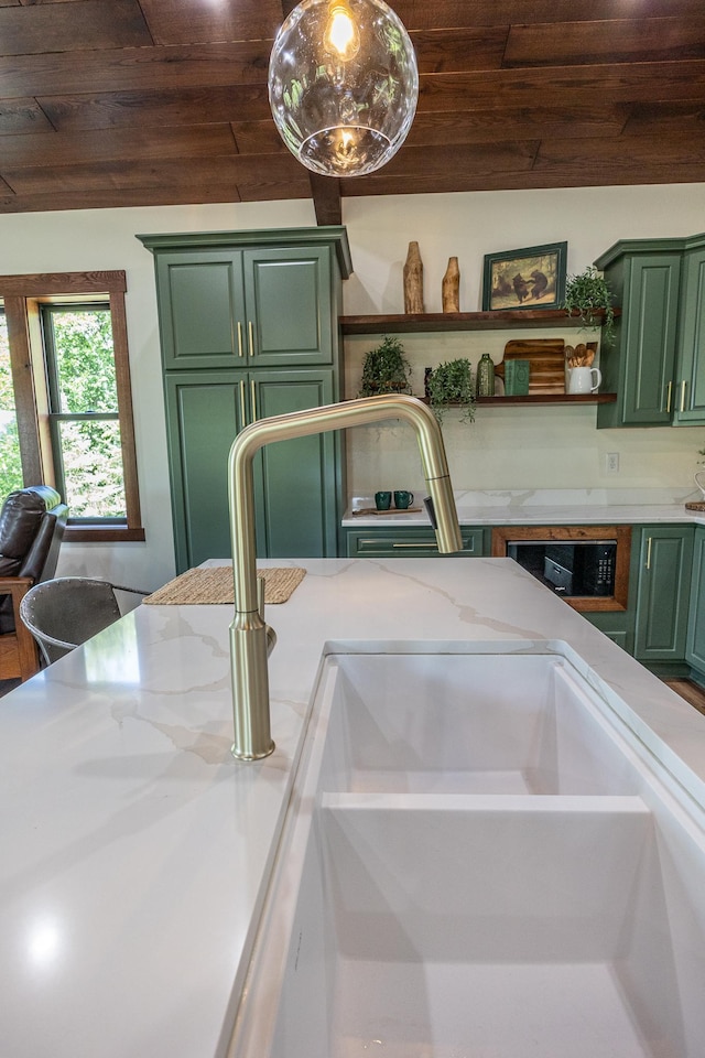 2018 County 5 NW, Hackensack, MN 56452 - kitchen view of green cabinetry, wood ceiling, open shelves, and light stone countertops