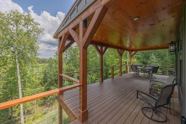 2018 County 5 NW, Hackensack, MN 56452 - wooden terrace featuring outdoor dining space