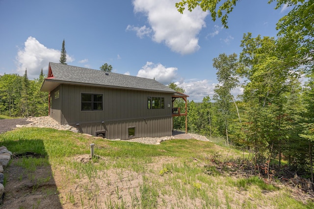 2018 County 5 NW, Hackensack, MN 56452 - view of side of home featuring a shingled roof
