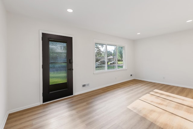 8517 Columbus Ave S, Bloomington, MN 55420 - entrance foyer with light wood finished floors and recessed lighting