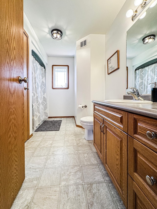 48285 229th Ave, Clearbrook, MN 56634 - bathroom with vanity and a shower with shower curtain