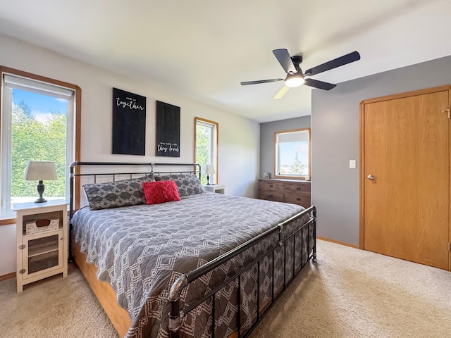 48285 229th Ave, Clearbrook, MN 56634 - carpeted bedroom with baseboards and a ceiling fan