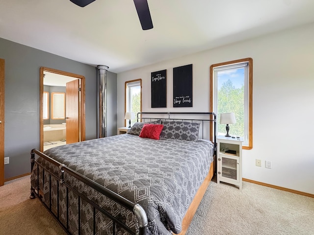 48285 229th Ave, Clearbrook, MN 56634 - bedroom featuring carpet flooring, ensuite bathroom, and a ceiling fan