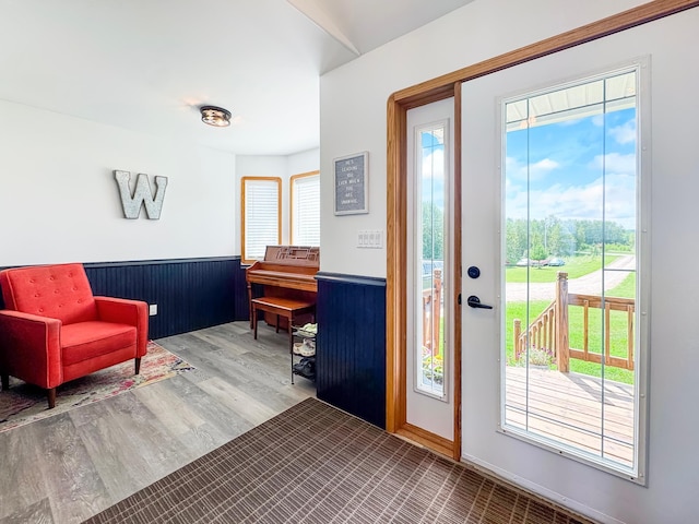 48285 229th Ave, Clearbrook, MN 56634 - entryway featuring a wainscoted wall and wood finished floors