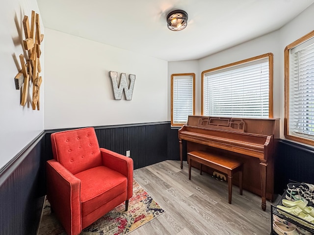 48285 229th Ave, Clearbrook, MN 56634 - living area featuring a wainscoted wall and wood finished floors