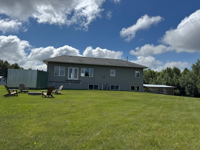 48285 229th Ave, Clearbrook, MN 56634 - back of property with a yard and an outdoor fire pit