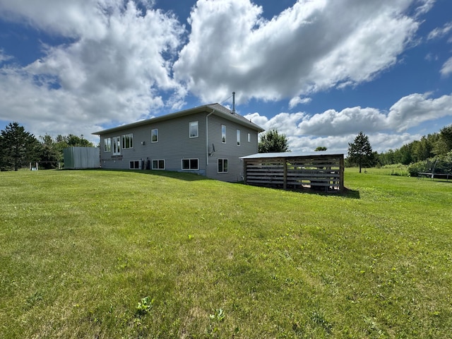 48285 229th Ave, Clearbrook, MN 56634 - rear view of house with a lawn