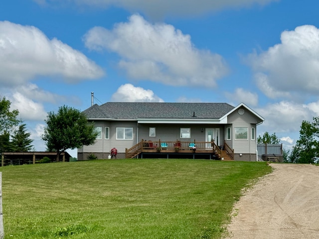 48285 229th Ave, Clearbrook, MN 56634 - rear view of house with crawl space, a deck, a lawn, stairs, and dirt driveway