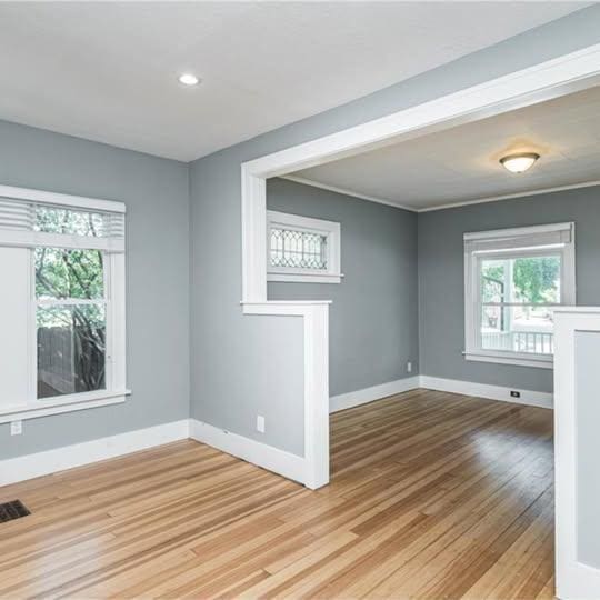 20 12th St NE, Rochester, MN 55906 - unfurnished room with wood finished floors and recessed lighting
