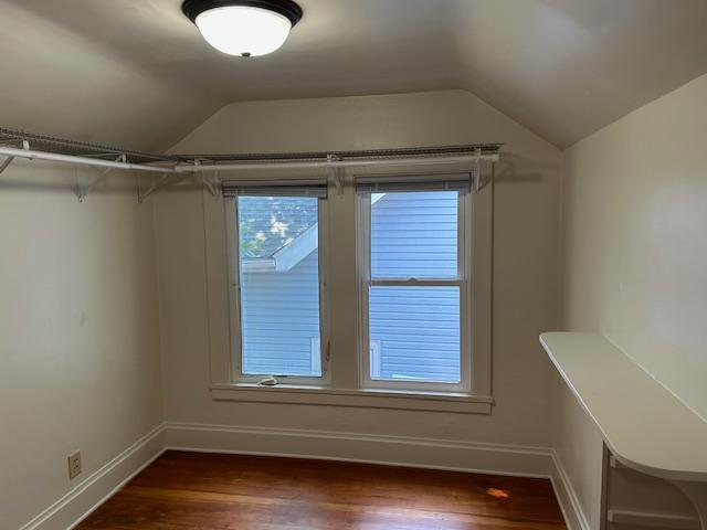3022 32nd Ave S, Minneapolis, MN 55406 - spacious closet with vaulted ceiling and dark wood finished floors