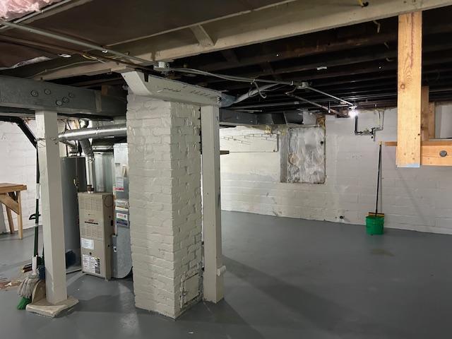 3022 32nd Ave S, Minneapolis, MN 55406 - unfinished basement featuring water heater