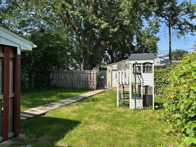 3022 32nd Ave S, Minneapolis, MN 55406 - view of yard featuring an outdoor structure