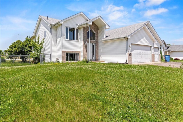 3455 Kahler Dr NE, Saint Michael, MN 55376 - view of front of house with brick siding, an attached garage, driveway, and roof with shingles