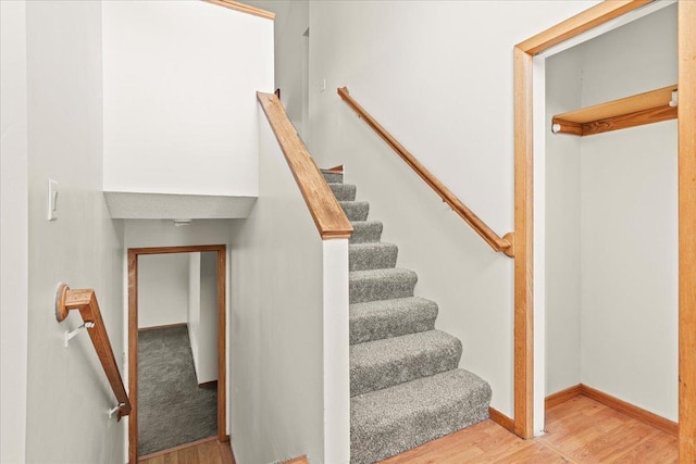 3455 Kahler Dr NE, Saint Michael, MN 55376 - staircase featuring wood finished floors and baseboards