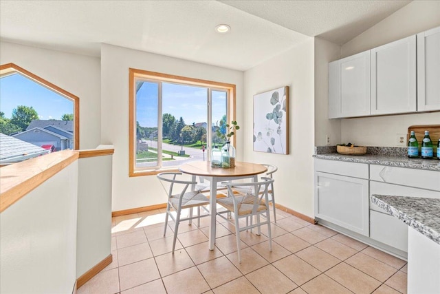 3455 Kahler Dr NE, Saint Michael, MN 55376 - dining room with recessed lighting and light tile patterned flooring