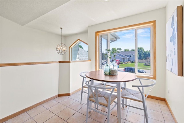 3455 Kahler Dr NE, Saint Michael, MN 55376 - dining area featuring a chandelier and light tile patterned floors