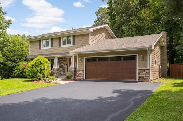 11735 52nd Ave N, Plymouth, MN 55442 - view of front of home with asphalt driveway, stone siding, an attached garage, a front yard, and a chimney