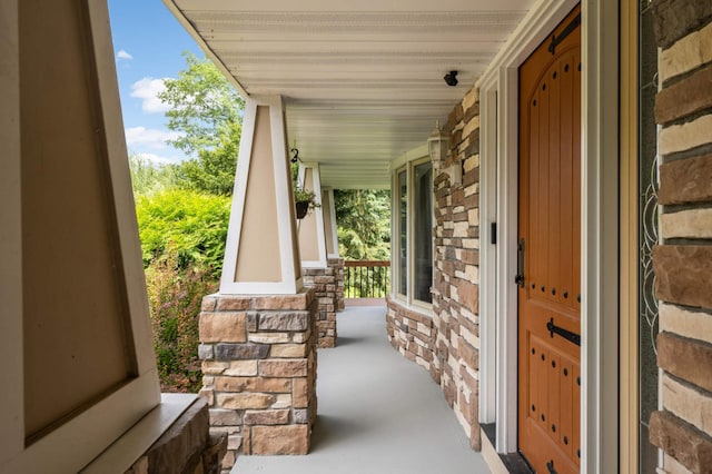 11735 52nd Ave N, Plymouth, MN 55442 - view of exterior entry featuring a porch and stone siding