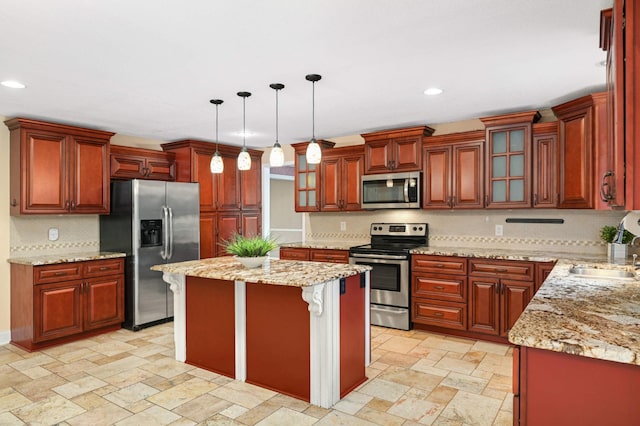 11735 52nd Ave N, Plymouth, MN 55442 - kitchen featuring appliances with stainless steel finishes, decorative backsplash, hanging light fixtures, a kitchen bar, and recessed lighting