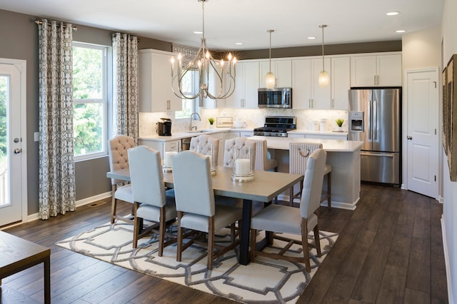 14620 106th Pl N, Maple Grove, MN 55369 - dining area featuring dark wood-type flooring, recessed lighting, and a chandelier
