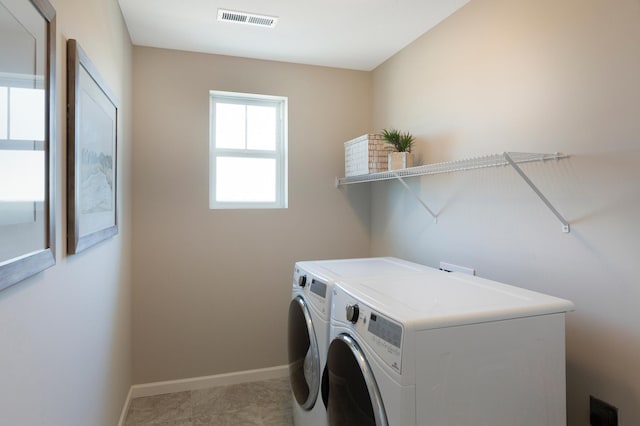14620 106th Pl N, Maple Grove, MN 55369 - laundry room with washing machine and dryer and baseboards