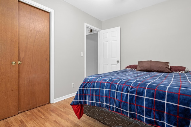 4405 6th St NE, Columbia Heights, MN 55421 - bedroom featuring wood finished floors and baseboards