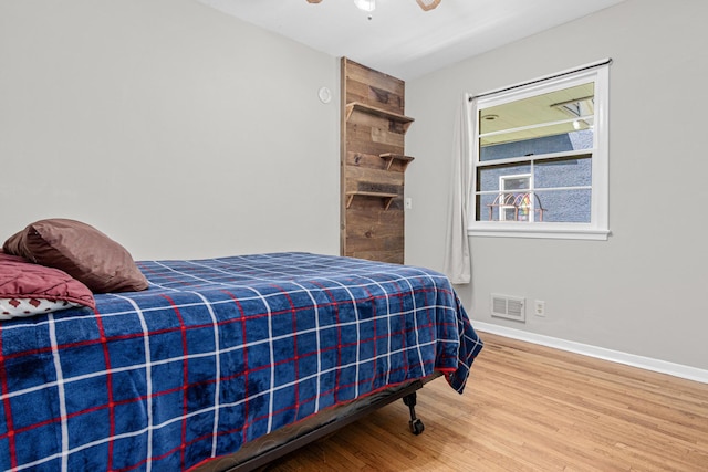 4405 6th St NE, Columbia Heights, MN 55421 - bedroom featuring wood finished floors and ceiling fan