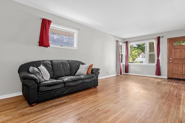 4405 6th St NE, Columbia Heights, MN 55421 - living area with light wood-style floors and baseboards