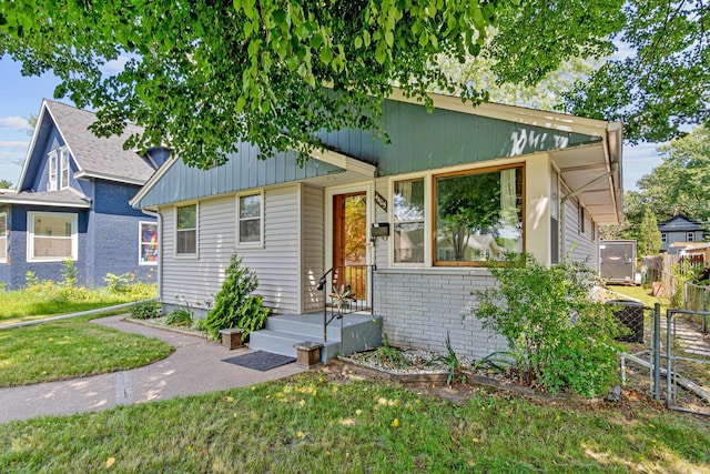 4405 6th St NE, Columbia Heights, MN 55421 - bungalow-style house with a gate