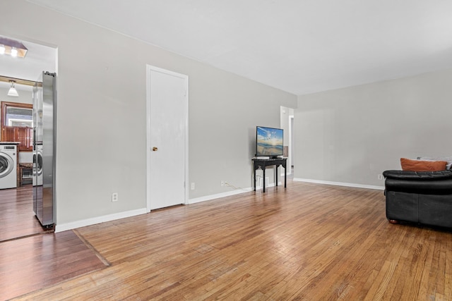 4405 6th St NE, Columbia Heights, MN 55421 - living room with washer / dryer and light wood finished floors