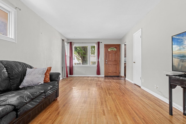 4405 6th St NE, Columbia Heights, MN 55421 - living area featuring light wood finished floors and baseboards