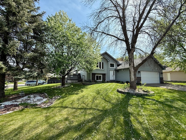 14303 Utica Ave, Savage, MN 55378 - tri-level home with a front yard, a garage, and driveway