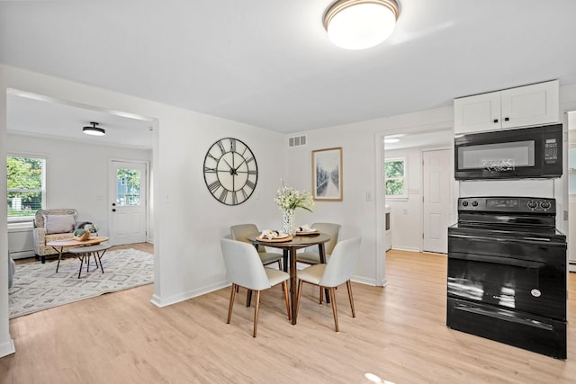 26030 2nd St W, Zimmerman, MN 55398 - dining area with light wood-style flooring