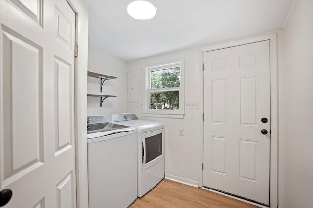 26030 2nd St W, Zimmerman, MN 55398 - laundry room with washer and dryer and light wood finished floors