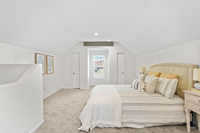 26030 2nd St W, Zimmerman, MN 55398 - carpeted bedroom featuring baseboards and vaulted ceiling
