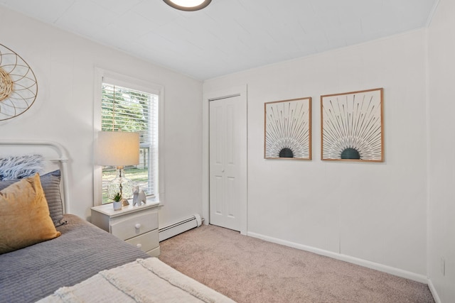 26030 2nd St W, Zimmerman, MN 55398 - bedroom featuring a baseboard heating unit, carpet, and a closet
